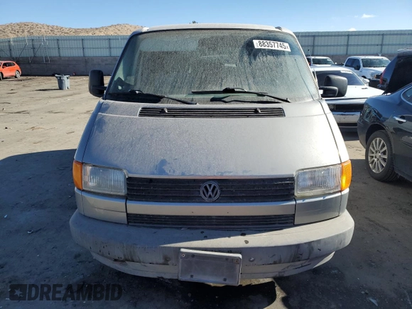 1993 Volkswagen EuroVan с VIN WV2HD0705PH059541, выставлен на аукционе Copart как лот 88357745 с пробегом 88 905 миль миль и Чистый • Clean title. История ставок и продаж доступна на DreamBid. Изображение 5.