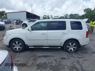 2012 Honda Pilot Touring with VIN 5FNYF3H9XCB035494, listed as a IAAI auction lot 42011362 with 271,887 mi miles and . Bid and sale history available at carsss.com. Image 15.