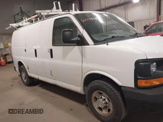 2015 Chevrolet Express Cargo Van with VIN 1GCWGFCF9F1167677, listed as a IAAI auction lot 42018087 with 148,263 mi miles. Bid and sale history available at carsss.com. Image 13.