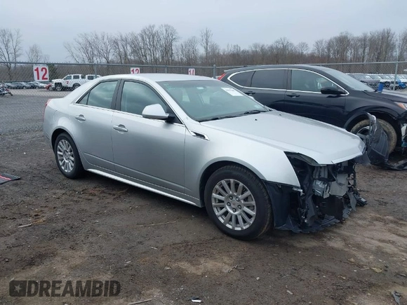 2012 Cadillac CTS z VIN 1G6DC5E52C0123719, wystawiony jako IAAI lot #41997649 z przebiegiem 79 705 mil mil oraz . Historia ofert i sprzedaży dostępna na DreamBid. Obrazek 1.