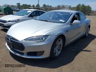 2015 Tesla Model S 85D with VIN 5YJSA1H2XFF084145, listed as a IAAI auction lot 42101755 with 105,660 mi miles. Bid and sale history available at carsss.com. Image 20.