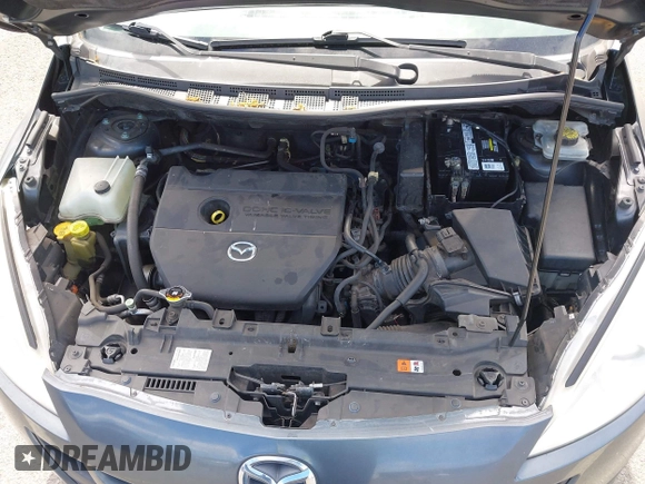 2012 Mazda 5 Grand Touring with VIN JM1CW2DL0C0139982, listed as a IAAI auction lot 42703430 with 129,763 mi miles and . Bid and sale history available at DreamBid. Image 10.