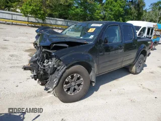 2015 Nissan Frontier Pro-4X with VIN 1N6AD0EV4FN716583, listed as a Copart auction lot 52324475 with Not provided miles and Salvage title. Bid and sale history available at DreamBid. Image 1.