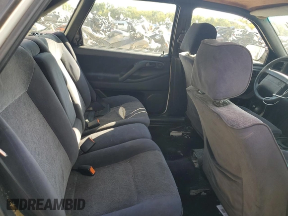 1997 Volkswagen Passat with VIN WVWGG83A0VB009323, listed as a Copart auction lot 73042334 with 261,740 mi miles and Salvage title. Bid and sale history available at DreamBid. Image 10.