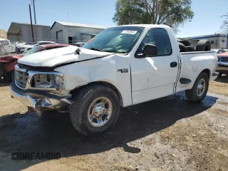 2000 Ford F-150 XL with VIN 1FTZF0727YKA84301, listed as a Copart auction lot 71593544 with 0 mi miles and Salvage Title. Bid and sale history available at carsss.com. Image 1.