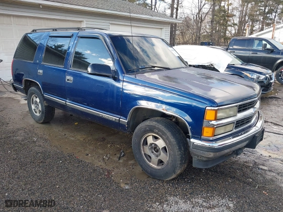 1998 Chevrolet Tahoe with VIN 1GNEK13RXWJ372276, listed as a IAAI auction lot 41458359 with 229,582 mi miles. Bid and sale history available at carsss.com. Image 1.