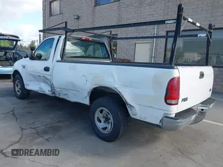2000 Ford F-150 XL with VIN 1FTRF17WXYKA72880, listed as a IAAI auction lot 41989317 with 149,967 mi miles. Bid and sale history available at carsss.com. Image 3.