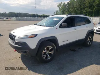 2014 Jeep Cherokee Trailhawk z VIN 1C4PJMBS5EW185510, wystawiony jako Copart lot #55780005 z przebiegiem 130 358 mil mil oraz Czysty tytuł • Clean title. Historia ofert i sprzedaży dostępna na DreamBid. Obrazek 1.