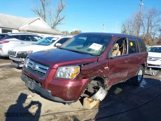 2007 Honda Pilot LX with VIN 2HKYF18167H510970, listed as a IAAI auction lot 40827681 with 119,011 mi miles. Bid and sale history available at carsss.com. Image 17.