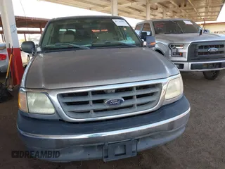 2003 Ford F-150 XLT with VIN 1FTRW07693KA29179, listed as a IAAI auction lot 41726462 with 191,365 mi miles. Bid and sale history available at carsss.com. Image 6.