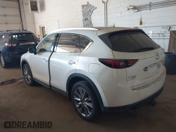 2019 Mazda CX-5 Grand Touring with VIN JM3KFBDM5K0520852, listed as a IAAI auction lot 42686818 with 36,800 mi miles and . Bid and sale history available at DreamBid. Image 3.