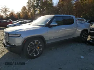 2022 Rivian R1T Launch Edition z VIN 7FCTGAAL6NN002704, wystawiony jako Copart lot #77913144 z przebiegiem 40 665 mil mil oraz Szkody całkowita. Historia ofert i sprzedaży dostępna na DreamBid. Obrazek 1.