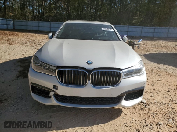 2016 BMW 7 Series 750i with VIN WBA7F0C58GGM20723, listed as a Copart auction lot 80143764 with 102,311 mi miles and Salvage Title. Bid and sale history available at carsss.com. Image 5.
