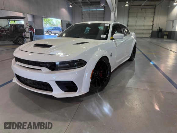 2021 Dodge Charger SRT Hellcat Widebody z VIN 2C3CDXL93MH662407, wystawiony jako Copart lot #58264615 z przebiegiem 56 012 mil mil oraz Czysty tytuł • Clean title. Historia ofert i sprzedaży dostępna na DreamBid. Obrazek 2.