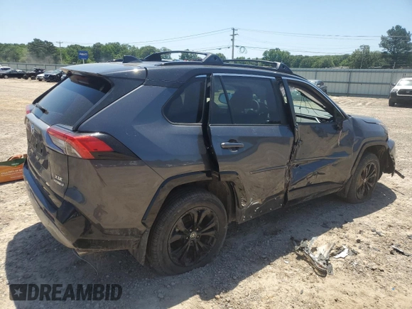 2023 Toyota RAV4 Hybrid XSE with VIN 2T3E6RFV9PW039963, listed as a Copart auction lot 57594335 with 27,486 mi miles and Salvage title. Bid and sale history available at DreamBid. Image 3.