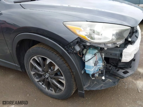 2016 Mazda CX-5 Grand Touring with VIN JM3KE4DY0G0652829, listed as a IAAI auction lot 41786042 with NaN miles. Bid and sale history available at carsss.com. Image 20.