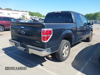 2014 Ford F-150 XL with VIN 1FTFW1CF5EKD93147, listed as a IAAI auction lot 42069973 with 277,140 mi miles. Bid and sale history available at carsss.com. Image 4.