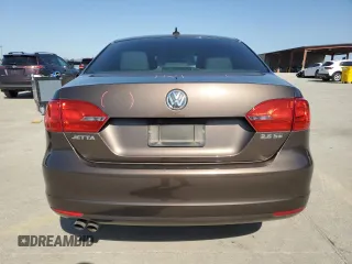 2012 Volkswagen Jetta Sedan SE w/Convenience with VIN 3VWDX7AJ1CM454317, listed as a Copart auction lot 48673205 with 136,971 mi miles and Salvage Title. Bid and sale history available at carsss.com. Image 6.
