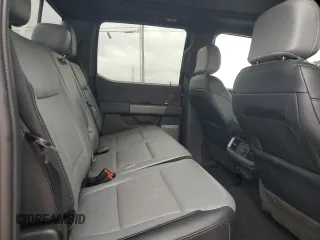 2023 Ford F-150 Lightning Pro z VIN 1FTVW1EV4PWG12935, wystawiony jako Copart lot #52685485 z przebiegiem Nie podano mil oraz Szkody całkowita. Historia ofert i sprzedaży dostępna na DreamBid. Obrazek 10.