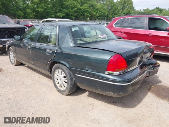 2003 Ford Crown Victoria LX z VIN 2FAFP74WX3X184730, wystawiony jako IAAI lot #42264132 z przebiegiem 297 561 mil mil oraz . Historia ofert i sprzedaży dostępna na DreamBid. Obrazek 3.