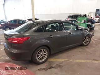 2015 Ford Focus SE with VIN 1FADP3F2XFL201554, listed as a IAAI auction lot 41817418 with 101,938 mi miles. Bid and sale history available at carsss.com. Image 4.