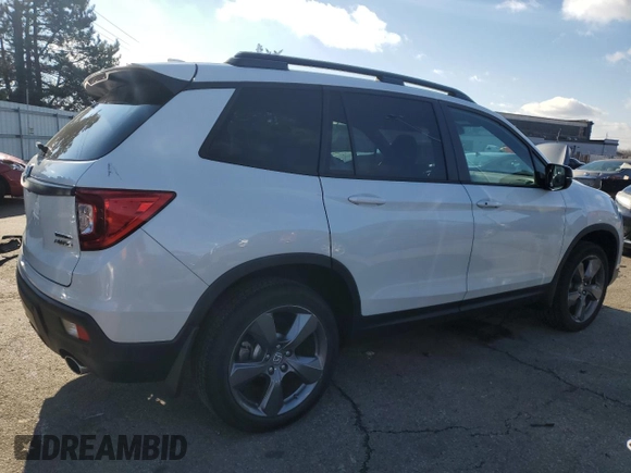 2021 Honda Passport Touring with VIN 5FNYF8H91MB027654, listed as a Copart auction lot 87270244 with 10,481 mi miles and Salvage Title. Bid and sale history available at carsss.com. Image 3.