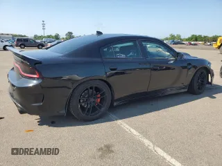2016 Dodge Charger R/T with VIN 2C3CDXCT1GH204252, listed as a Copart auction lot 61090155 with 153,395 mi miles and Salvage title. Bid and sale history available at DreamBid. Image 3.