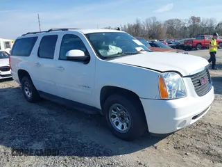2014 GMC Yukon XL SLT with VIN 1GKS1KE09ER116590, listed as a IAAI auction lot 41459319 with 246,958 mi miles. Bid and sale history available at carsss.com. Image 1.