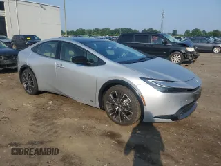 2024 Toyota Prius LE with VIN JTDADABU8R3020720, listed as a Copart auction lot 60815005 with 2,594 mi miles and Salvage title. Bid and sale history available at DreamBid. Image 4.