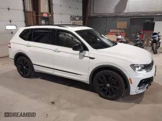 2020 Volkswagen Tiguan SE with VIN 3VV2B7AX1LM106600, listed as a IAAI auction lot 40259436 with 56,736 mi miles. Bid and sale history available at carsss.com. Image 1.