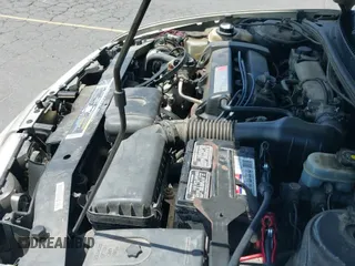 1999 Saturn SL z VIN 1G8ZK5275XZ283178, wystawiony jako IAAI lot #42303549 z przebiegiem 216 776 mil mil oraz . Historia ofert i sprzedaży dostępna na DreamBid. Obrazek 12.