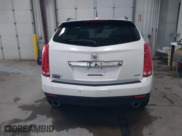 2014 Cadillac SRX Performance Collection with VIN 3GYFNFE36ES615440, listed as a IAAI auction lot 41830849 with 125,128 mi miles and . Bid and sale history available at DreamBid. Image 17.
