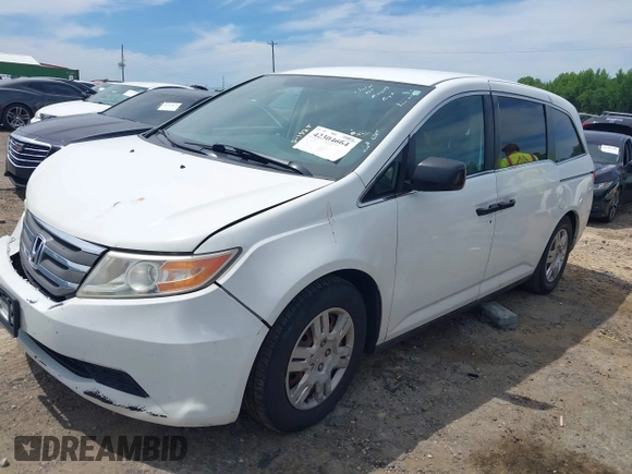 2012 Honda Odyssey LX z VIN 5FNRL5H28CB096385, wystawiony jako IAAI lot #42304664 z przebiegiem 105 010 mil mil oraz . Historia ofert i sprzedaży dostępna na DreamBid. Obrazek 17.