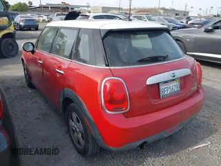 2015 MINI Hardtop 4 Door with VIN WMWXS5C59FT832549, listed as a IAAI auction lot 42106686 with 149,358 mi miles and . Bid and sale history available at DreamBid. Image 3.