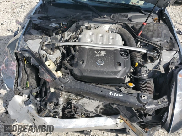 2005 Nissan 350Z with VIN JN1AZ34D05M606703, listed as a Copart auction lot 69631414 with 133,519 mi miles and Salvage Title. Bid and sale history available at DreamBid. Image 13.