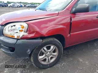 2006 Kia Sportage LX with VIN KNDJF723567236257, listed as a IAAI auction lot 42241914 with 185,503 mi miles and . Bid and sale history available at DreamBid. Image 12.