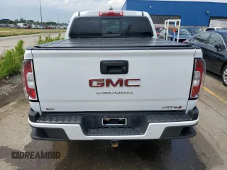 2021 GMC Canyon 4WD AT4 w/Cloth with VIN 1GTG6FEN8M1295482, listed as a Copart auction lot 59433404 with 34,637 mi miles and Non Repairable. Bid and sale history available at carsss.com. Image 6.