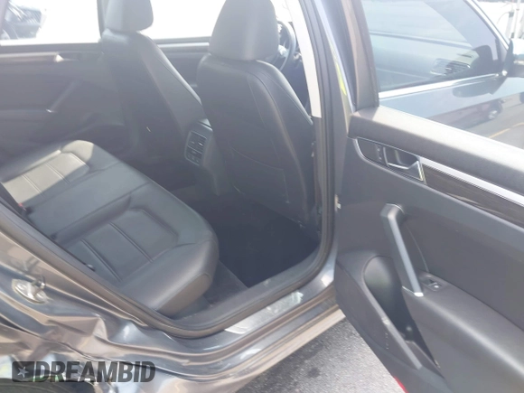 2017 Volkswagen Passat SE with VIN 1VWGT7A33HC058764, listed as a IAAI auction lot 42668036 with 76,732 mi miles and . Bid and sale history available at DreamBid. Image 8.