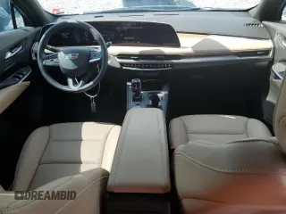 2025 Cadillac XT4 FWD Premium Luxury z VIN 1GYFZCR43SF128251, wystawiony jako Copart lot #59265035 z przebiegiem 7 271 mil mil oraz Czysty tytuł • Clean title. Historia ofert i sprzedaży dostępna na DreamBid. Obrazek 8.
