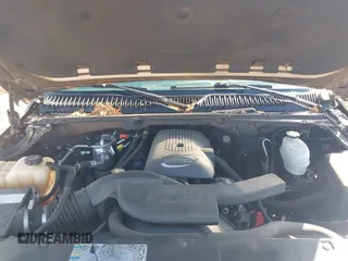 2004 Chevrolet Tahoe LT z VIN 1GNEC13Z04R130978, wystawiony jako IAAI lot #42073871 z przebiegiem 214 947 mil mil oraz . Historia ofert i sprzedaży dostępna na DreamBid. Obrazek 10.