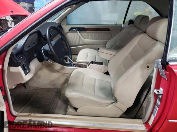 1994 Mercedes-Benz E 320 with VIN WDBEA66E8RC044069, listed as a Copart auction lot 87713565 with 69,061 mi miles and Salvage Title. Bid and sale history available at DreamBid. Image 7.
