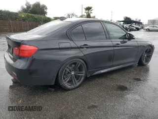 2014 BMW 3 Series 335i with VIN WBA3A9C55EF479359, listed as a Copart auction lot 48224715 with 98,747 mi miles and Salvage Title. Bid and sale history available at carsss.com. Image 3.