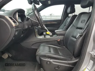 2015 Jeep Grand Cherokee Overland with VIN 1C4RJECG4FC808241, listed as a Copart auction lot 59699685 with 67,542 mi miles and Salvage title. Bid and sale history available at DreamBid. Image 7.