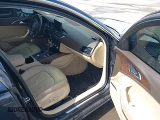 2014 Audi A6 Premium Plus with VIN WAUDFAFC7EN052529, listed as a IAAI auction lot 42667659 with 143,668 mi miles and . Bid and sale history available at DreamBid. Image 5.