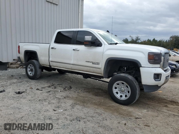 2016 GMC Sierra 3500HD Denali z VIN 1GT42YE84GF148264, wystawiony jako Copart lot #79954814 z przebiegiem 182 548 mil mil oraz Szkoda całkowita • Salvage title. Historia ofert i sprzedaży dostępna na DreamBid. Obrazek 4.