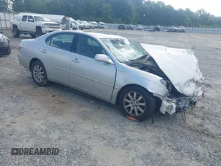 2002 Lexus ES 300 z VIN JTHBF30G220025571, wystawiony jako IAAI lot #42289997 z przebiegiem 87 554 mil mil oraz . Historia ofert i sprzedaży dostępna na DreamBid. Obrazek 1.