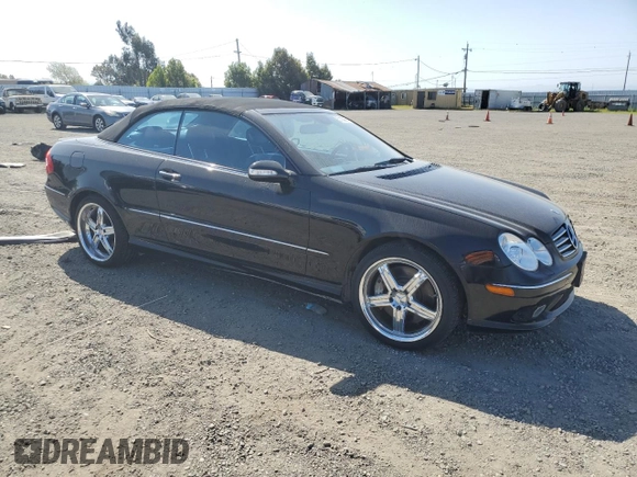 2005 Mercedes-Benz CLK 500 with VIN WDBTK75GX5T045859, listed as a Copart auction lot 51100995 with 130,761 mi miles and Salvage title. Bid and sale history available at DreamBid. Image 4.