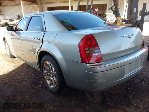 2006 Chrysler 300 C with VIN 2C3LA63H46H290377, listed as a IAAI auction lot 42035128 with 103,847 mi miles and . Bid and sale history available at carsss.com. Image 3.