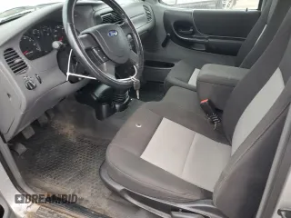 2004 Ford Ranger XL Fleet with VIN 1FTYR15E84PB61390, listed as a Copart auction lot 82563064 with 97,480 mi miles and Salvage Title. Bid and sale history available at DreamBid. Image 7.