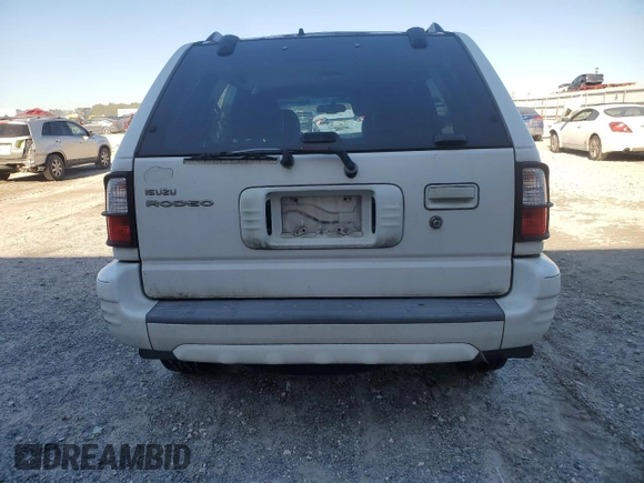 2001 Isuzu Rodeo S with VIN 4S2CK58W514310849, listed as a Copart auction lot 89221945 with 138,720 mi miles and Salvage title. Bid and sale history available at DreamBid. Image 6.